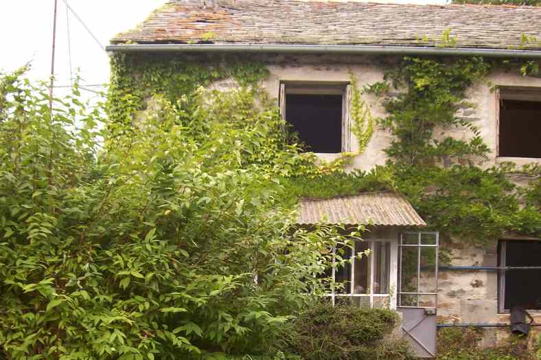 Rénovation d'une maison en pierre à Queyrières